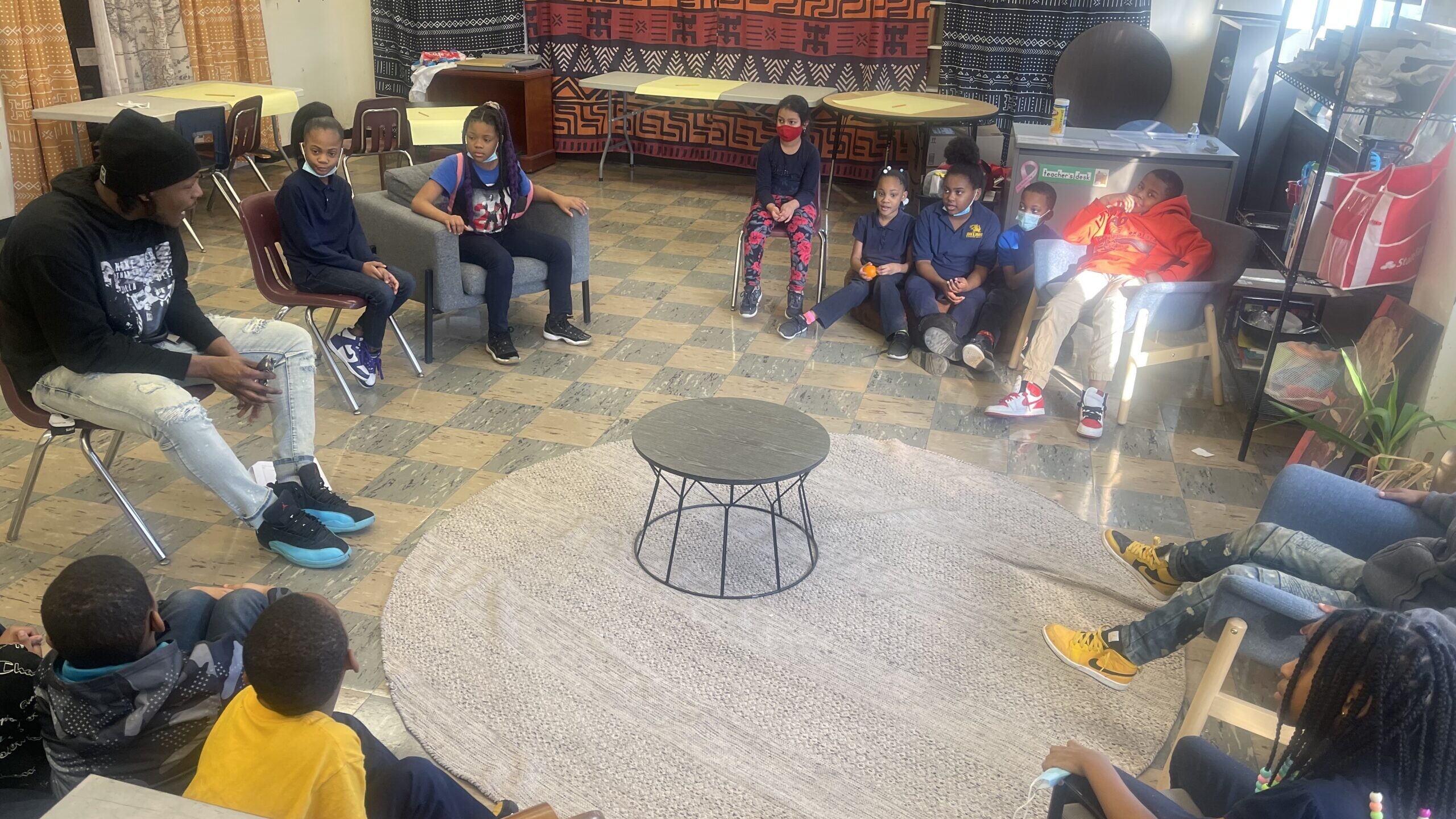 Haki McLaurin, Restorative Justice Coordinator at KOCO, holds a Circle Experience with students at Drake Elementary.